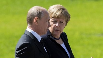 Путин и Меркель говорили о Сенцове
