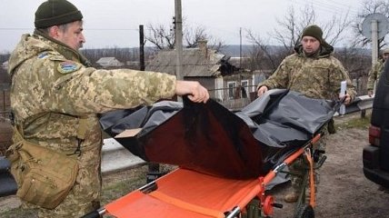 Военные передали боевикам ОРЛО тела 2 выходцев из РФ
