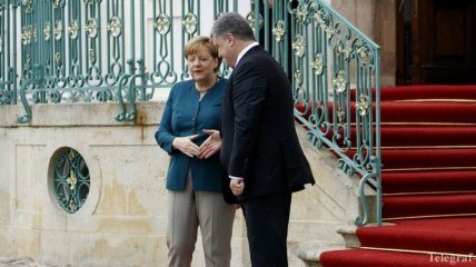 Как Меркель встречала Порошенко в замке Месеберг (Фото)