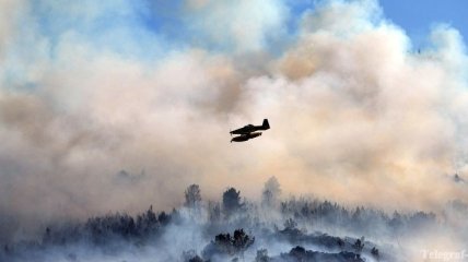 Военная авиация тушит лесные пожары в Сибири