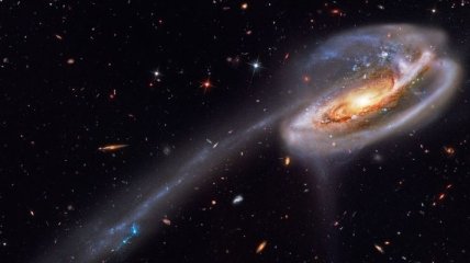 Космический телескоп Hubble сделал невероятный снимок столкновения двух галактик