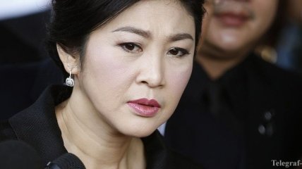 Осужденная за коррупцию экс-премьер Таиланда бежала в Лондон