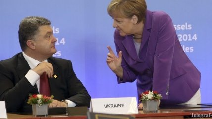 Порошенко и Меркель пришли к согласию по ключевой задаче 