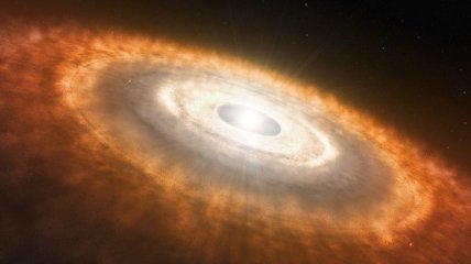Ученые измерили расстояние между звездой и протопланетным диском