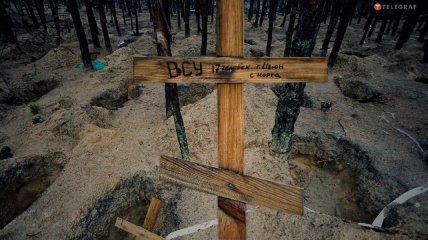 Правоохоронці завершили ексгумацію тіл в лісі біля Ізюма