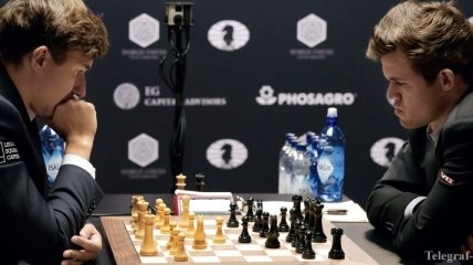 Сохранение интриги: Карлсен и Карякин сыграли 9-ю партию чемпионского матча