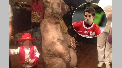 Российский футболист привел медведя на день рождения сына