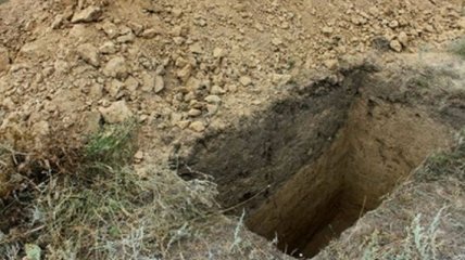 В России мужчина копал могилу и умер в ней 