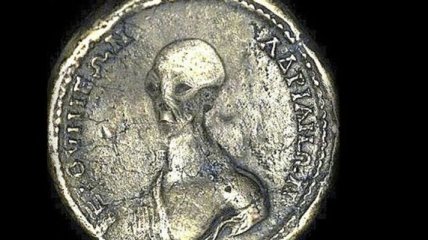 Найдена монета с изображением пришельца