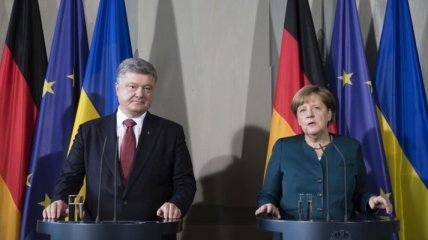 Меркель и Порошенко обсудят урегулирование ситуации на Донбассе