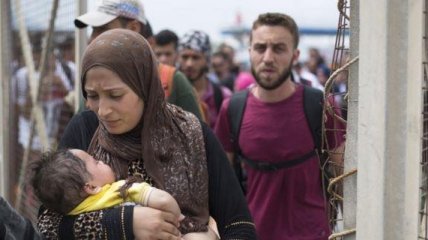 Турция пригрозила Евросоюзу открыть путь для беженцев из Сирии 