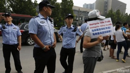 Полицейских в Китае учат не травмировать задержанных