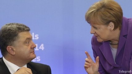 Порошенко обсудил с Меркель возможное выделение помощи