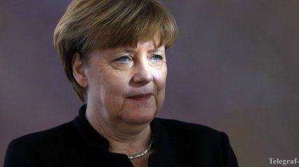 Меркель наградили Орденом францисканцев "Лампада мира"