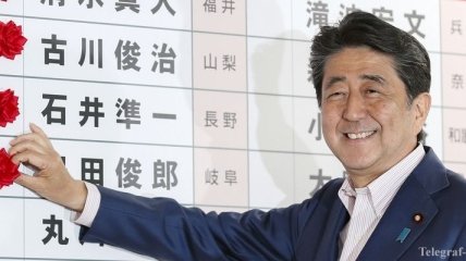 Парламентские выборы в Японии: партия Абэ победила