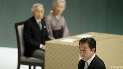 Премьер Японии пообещал провести досрочные парламентские выборы