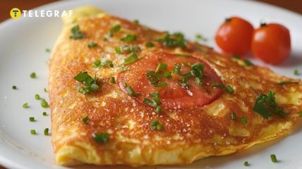 Омлет з помідорами - чудовий варіант сніданку (зображення створено за допомогою ШІ)