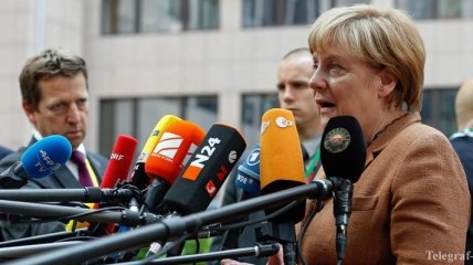 Меркель: Путин обязался приложить усилия для выполнения Минских соглашений