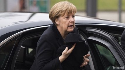 Меркель: Путин надавил на боевиков, чтобы те согласились на перемирие