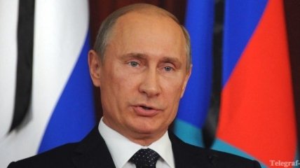 Путин подписал закон об ответственности за клевету
