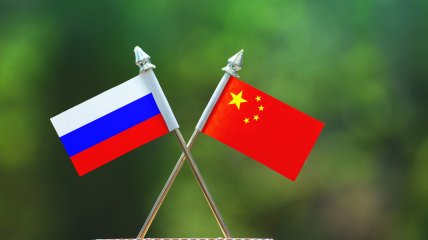 КНР допомагає росії