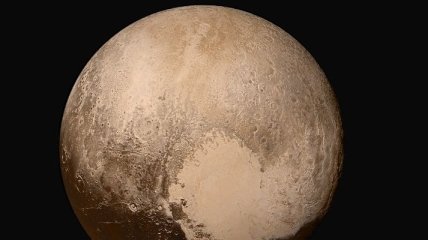 NASA: Харон защищает Плутон от солнечного ветра