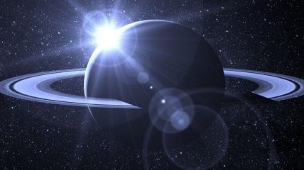 "Кассини" передал общее фото Сатурна со спутником Мимасом