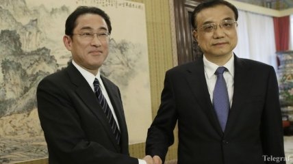 Японский глава МИД поехал в Пекин