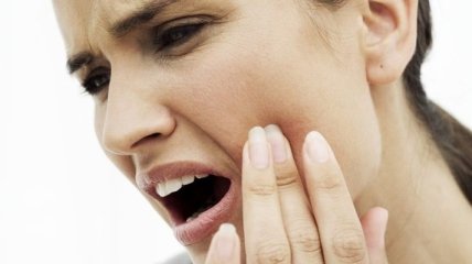 Болезни почек могут спровоцировать больные зубы