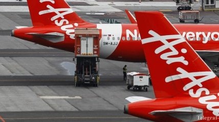 На месте катастрофы самолета AirAsia нашли 6 тел