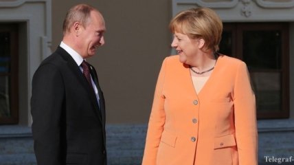 Меркель намерена встретиться с Путиным во Франции