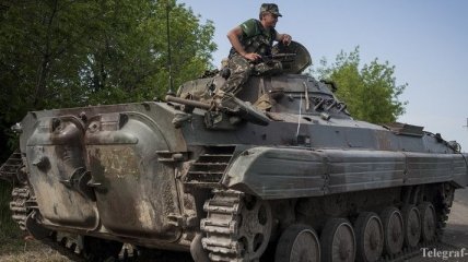 В Луганске продолжается бой пограничного отряда с террористами