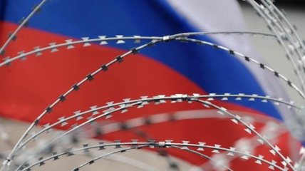 росія залишається під санкціями заходу