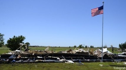 Число жертв торнадо, обрушившихся на США, возросло до 19