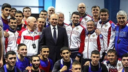 владимир путин и российские спортсмены