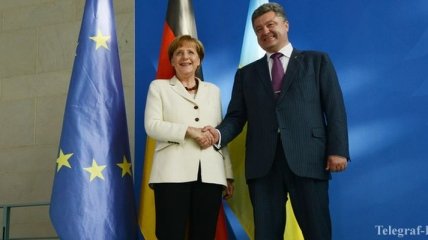 Порошенко - Меркель: Ваше участие в разрешении конфликта в Украине критически важно