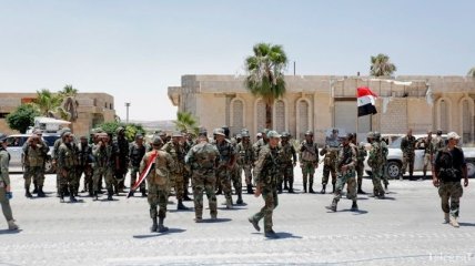 Армия Сирии при поддержке РФ вошла в город, породивший войну 
