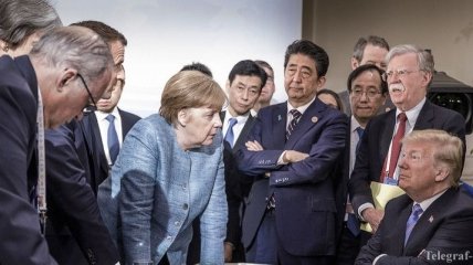Снимок Трампа и Меркель на саммите G7 превратили в мем