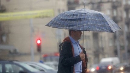 Чоловік з парасолькою