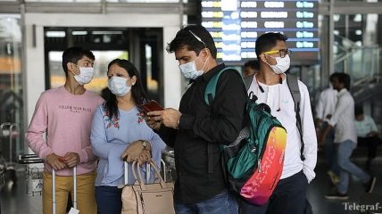 Сначала карантин: Китай вводит новые правила въезда в страну