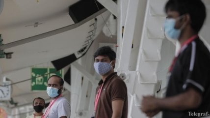 Коронавирус: за жителями Сингапура будут "присматривать" через гаджеты