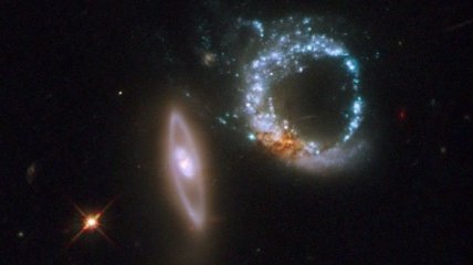 NASA показало удивительный снимок двойной галактики