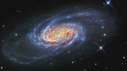 "Хаббл" сделал снимок галактики - "жертвы" гравитационного взаимодействия