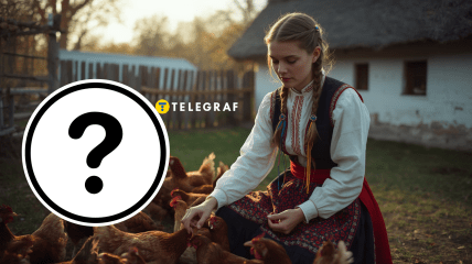 Українка годує курей