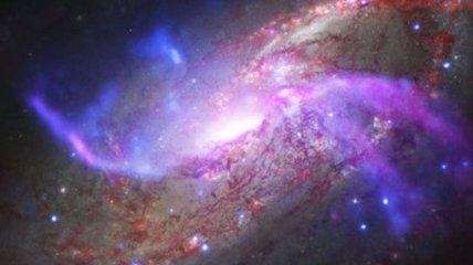 Ученые исследовали распыляющуюся галактику