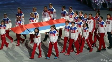 Евгений Плющенко, несмотря на травму, приехал на закрытие Олимпиады