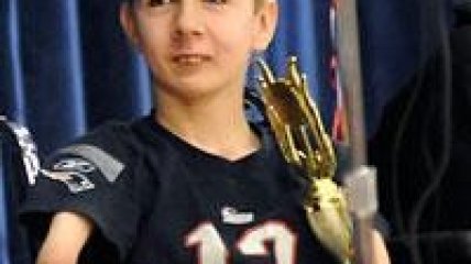 Ребенок без рук и без ног выиграл конкурс по каллиграфии