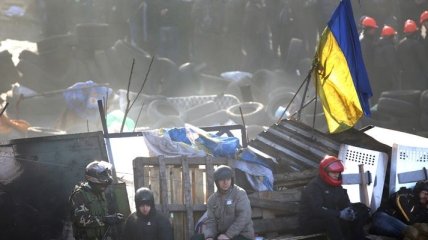 Участники акций протеста начали вывозить тела погибших с Майдана