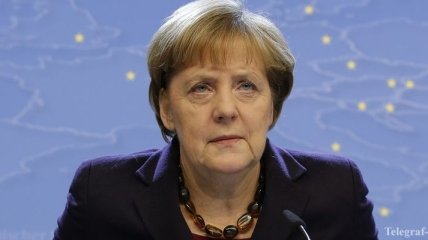 СМИ: Меркель побеждает русского медведя 