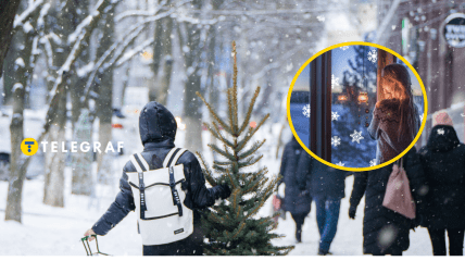 Снежная праздничная улица и девушка, что смотрит в окно